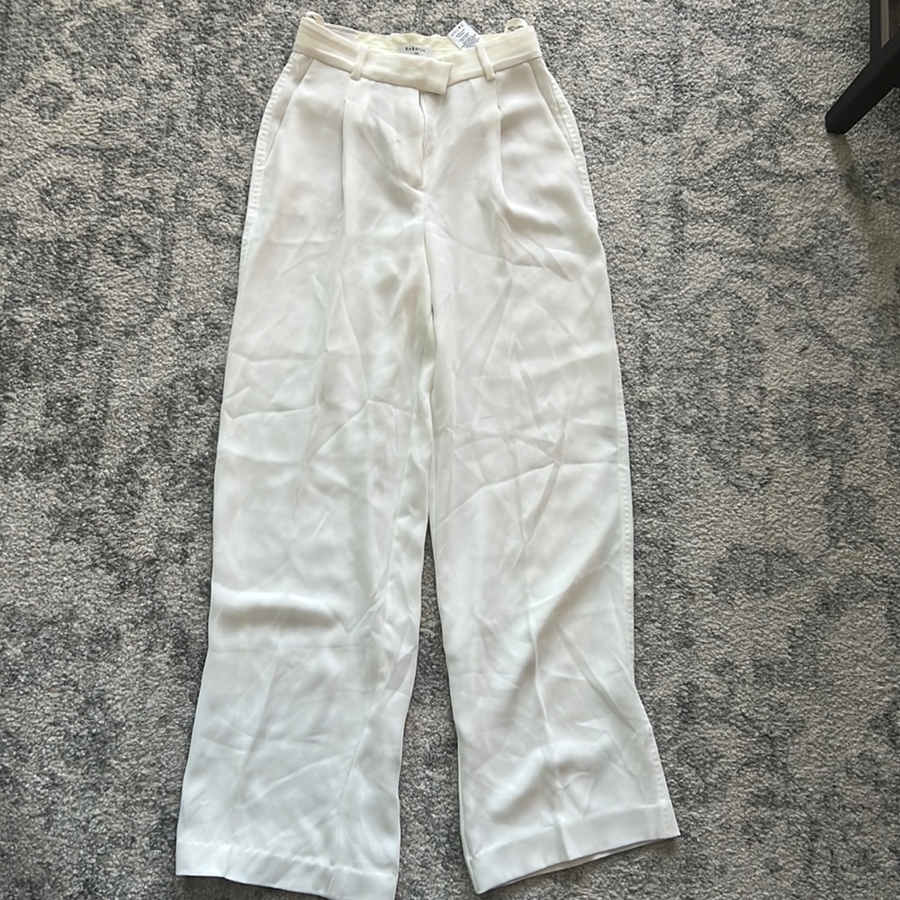 Never worn Babaton white pants